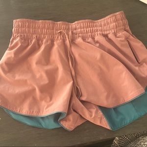 Blue and Pink/Rosy Reversible Lululemon Shorts.